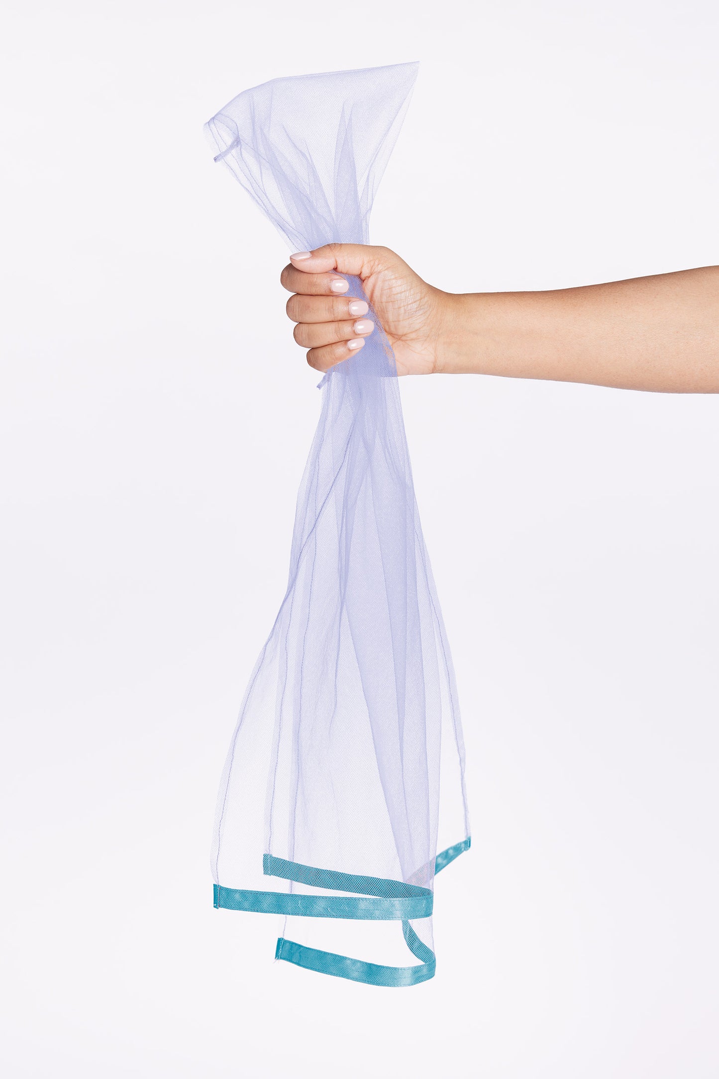 girl holding on blue dupatta