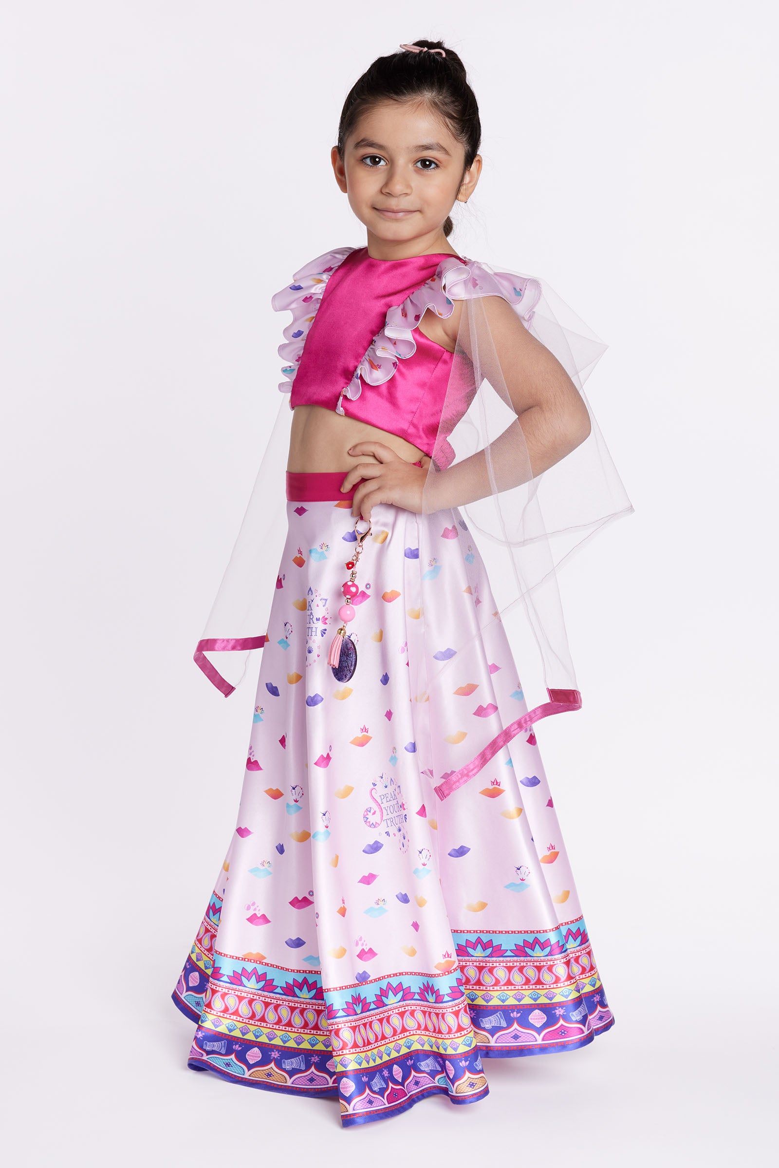 Girl wearing pink lehenga party dress front posing